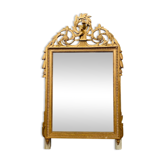 Louis XVI style mirror in wood and gilded stucco XIX century,, 122x72 cm