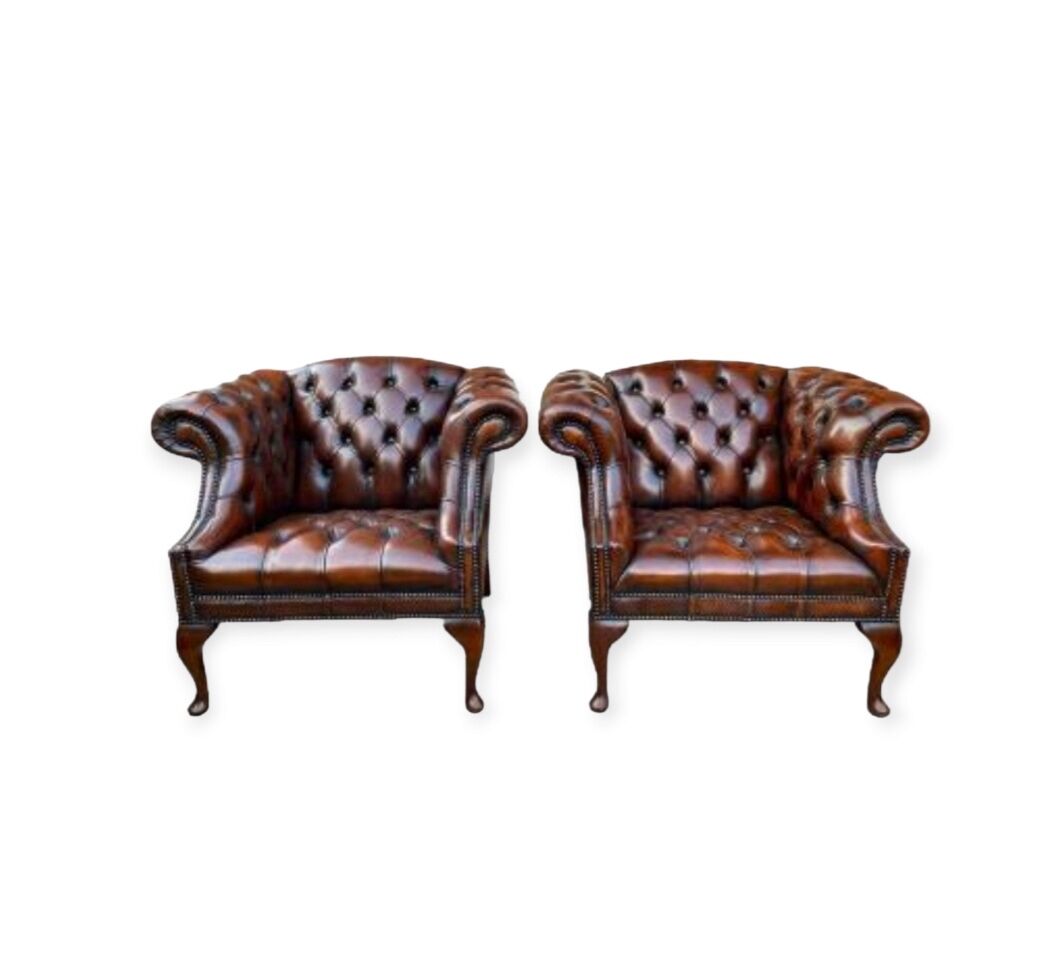 Pair of leather Chesterfield armchairs