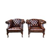 Pair of leather Chesterfield armchairs