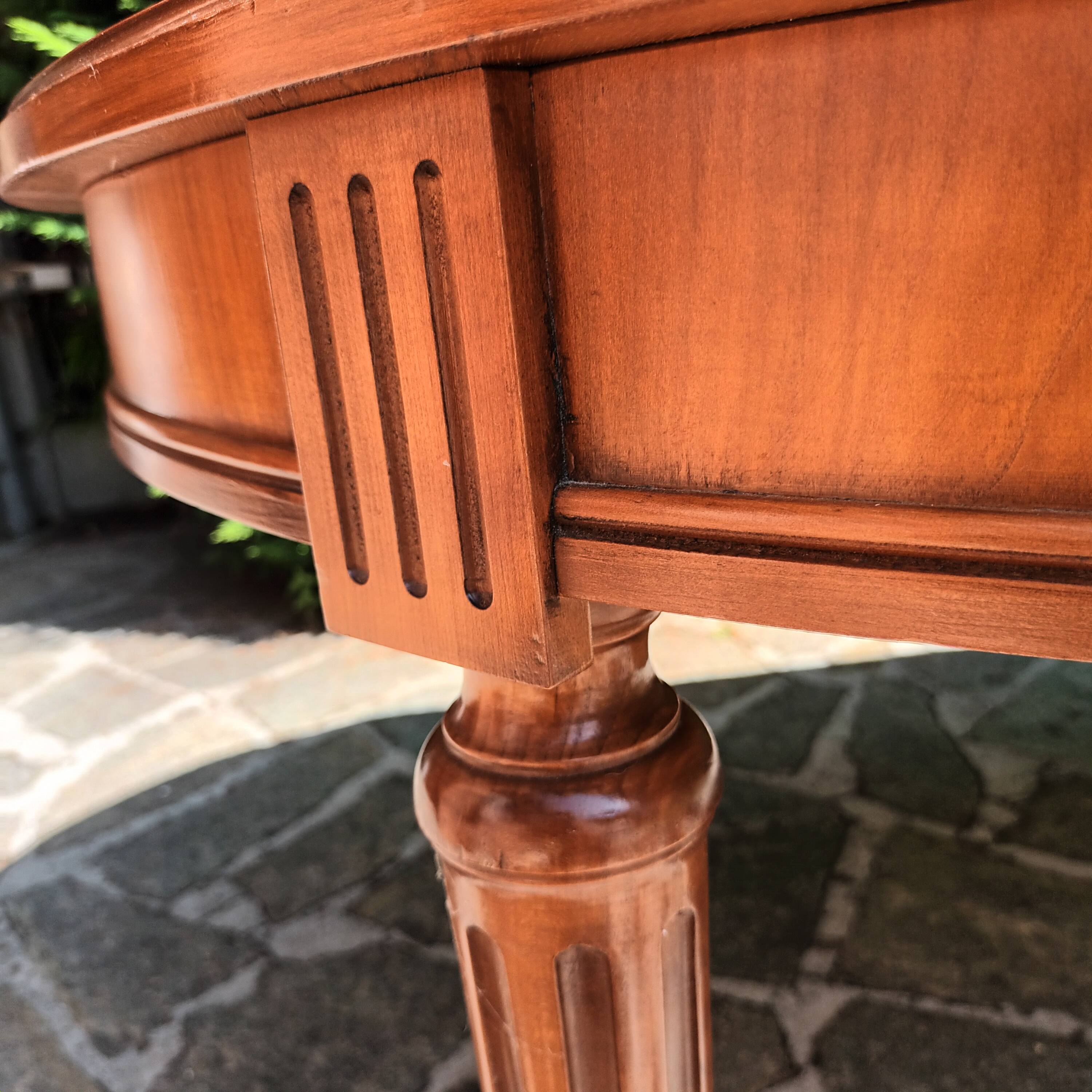 Cherry wood Louis XVI table with 2 extensions.