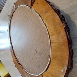 Oval mirror in dark rattan