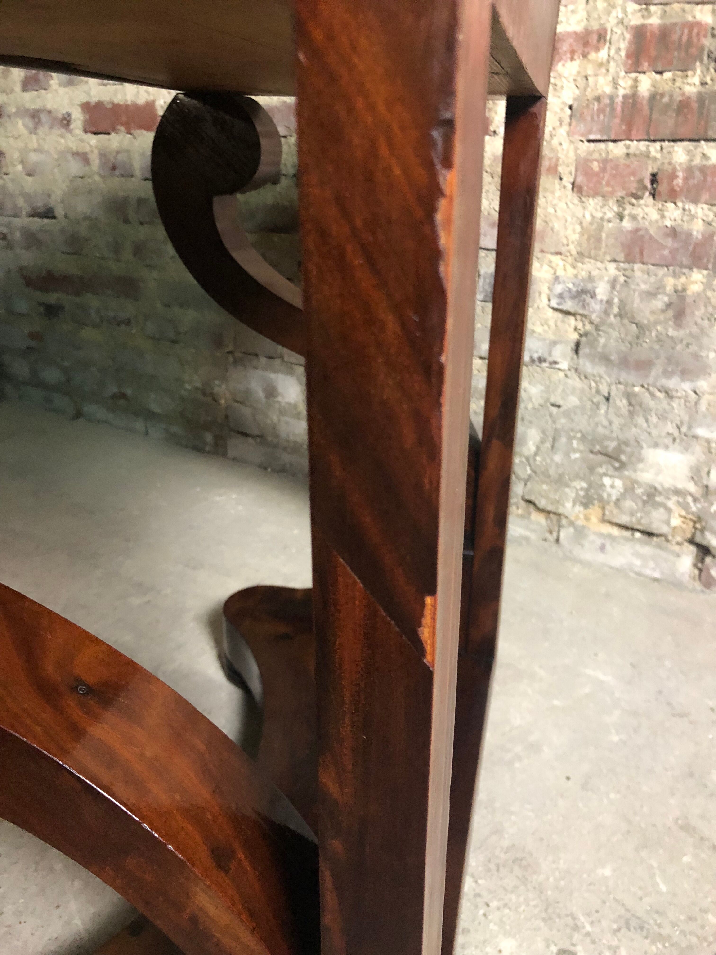 Console era restoration in mahogany veneer with St. Anne marble top.