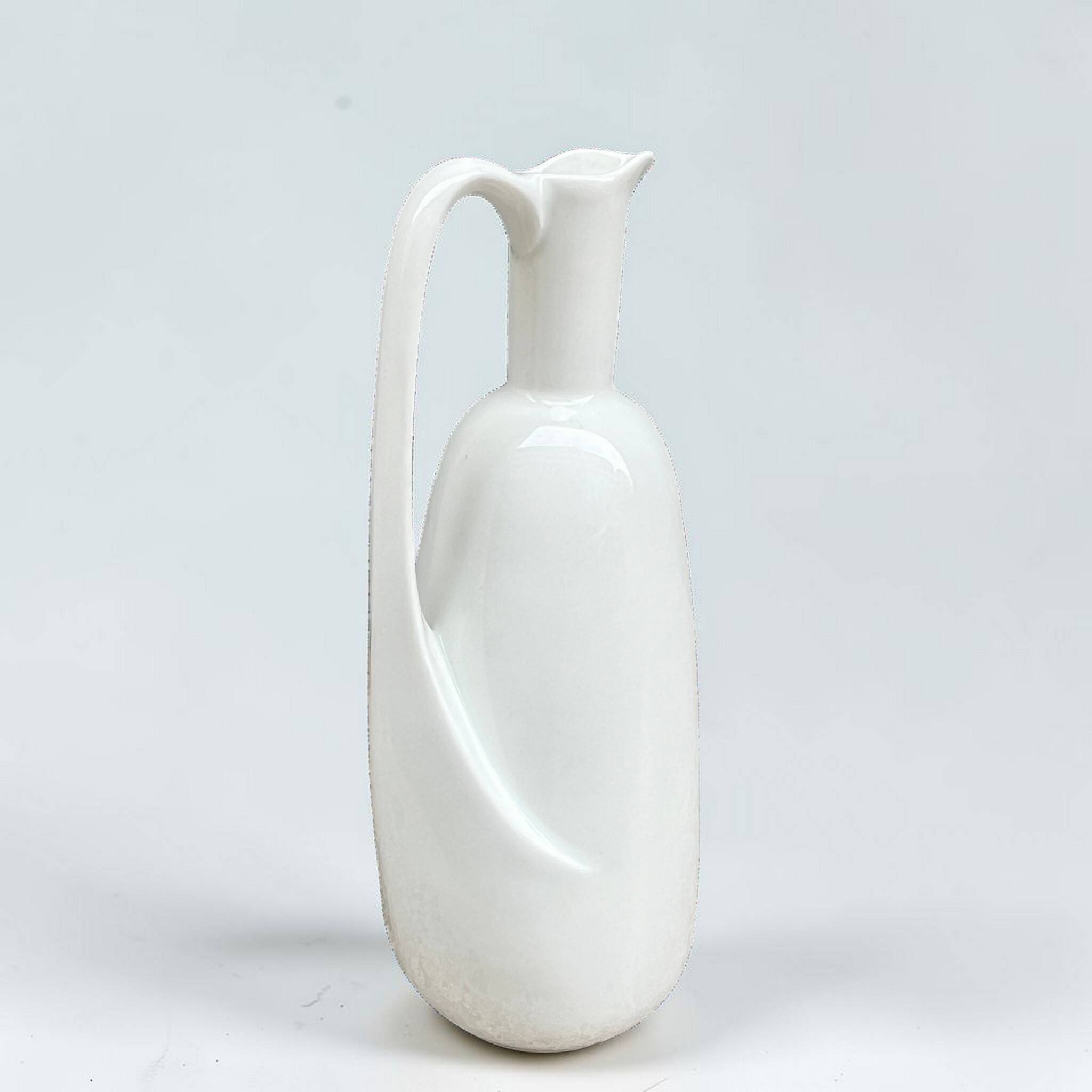 Modernist pitcher in vintage white porcelain water carafe in porcelain.