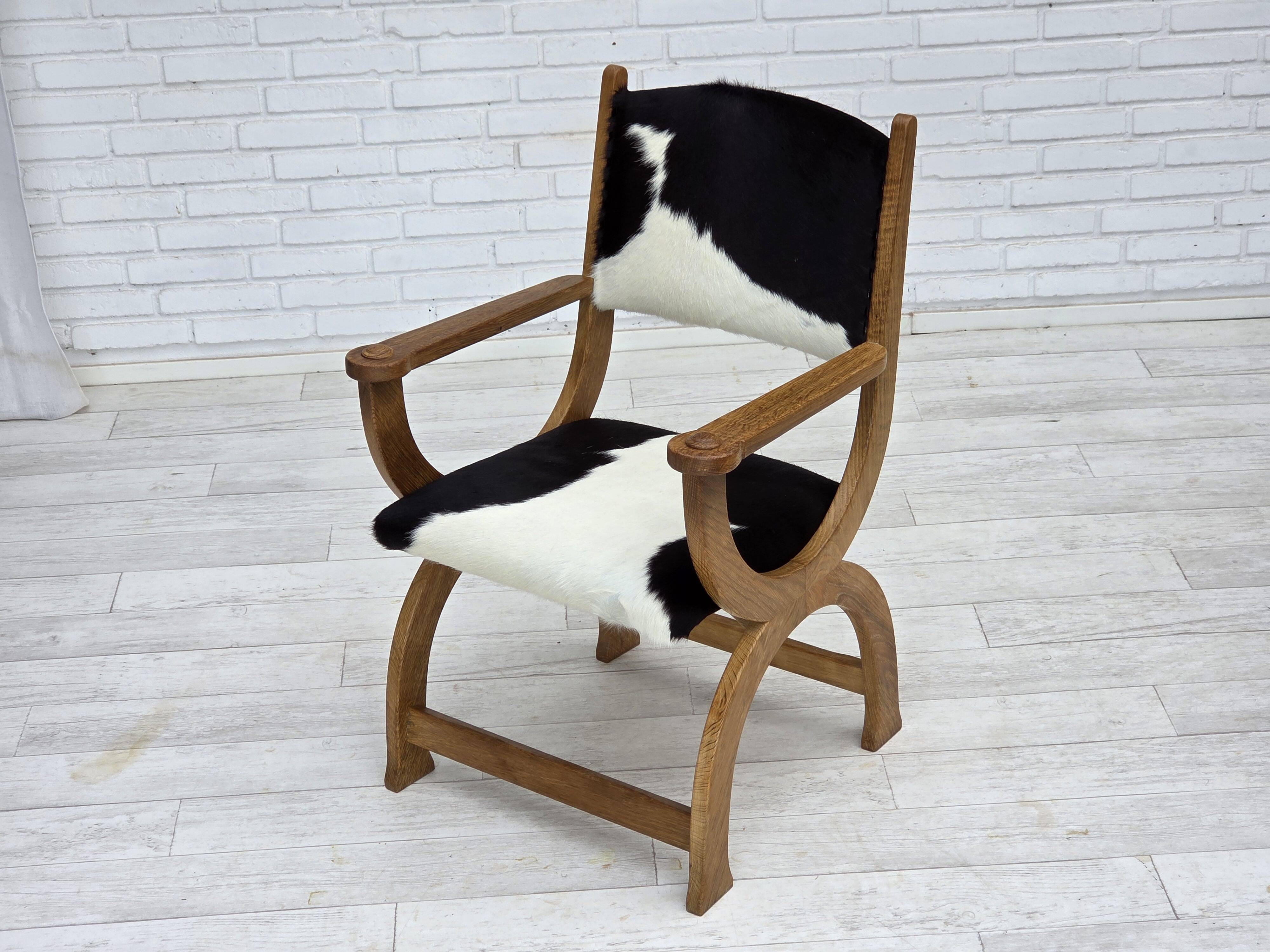 1960s, Danish highback armchair, genuine cowhide, oak wood, reupholstered.