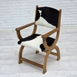 1960s, Danish highback armchair, genuine cowhide, oak wood, reupholstered.