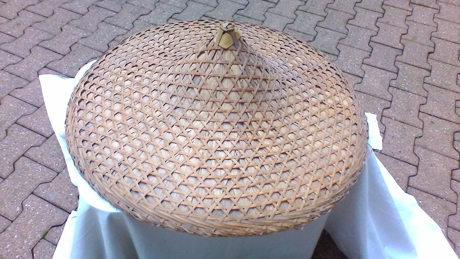Vintage Asian hat braided palms and bamboo for decoration