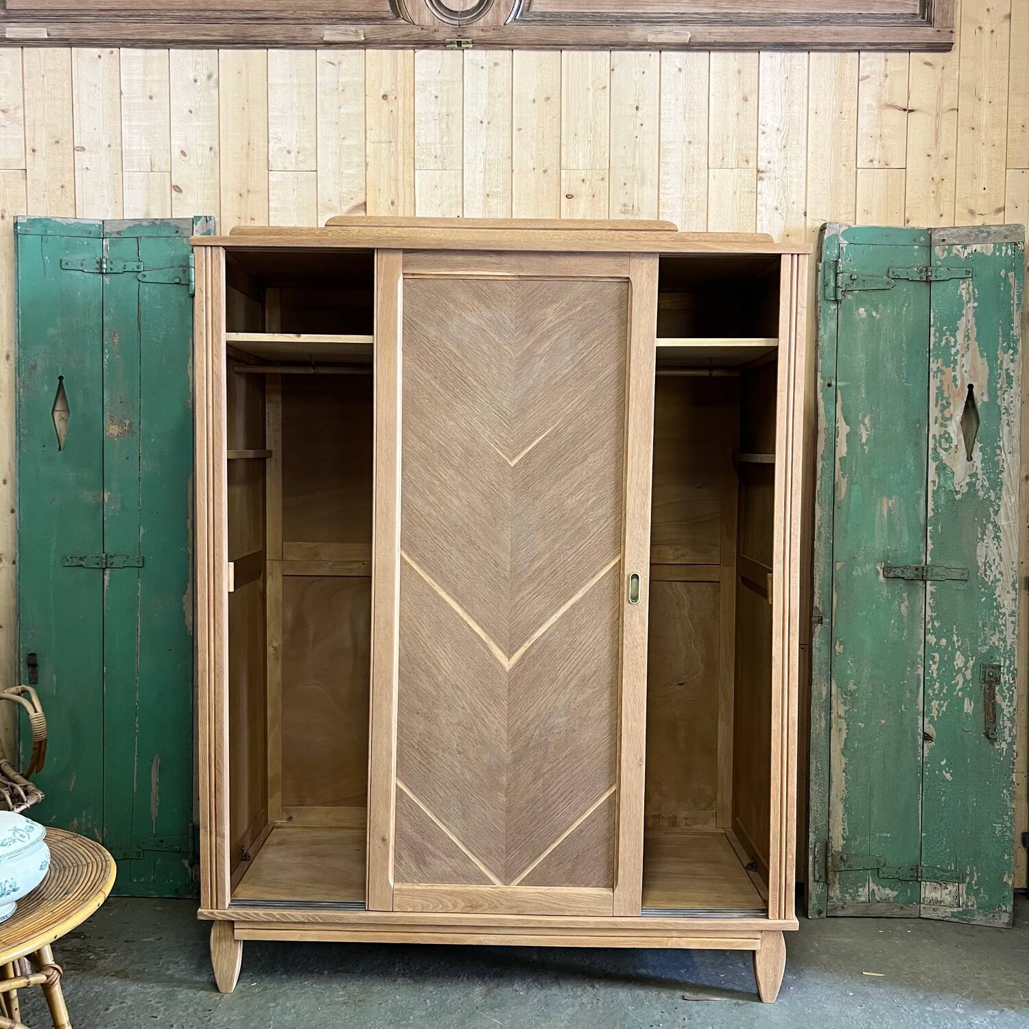 Vintage sliding wardrobe in raw oak