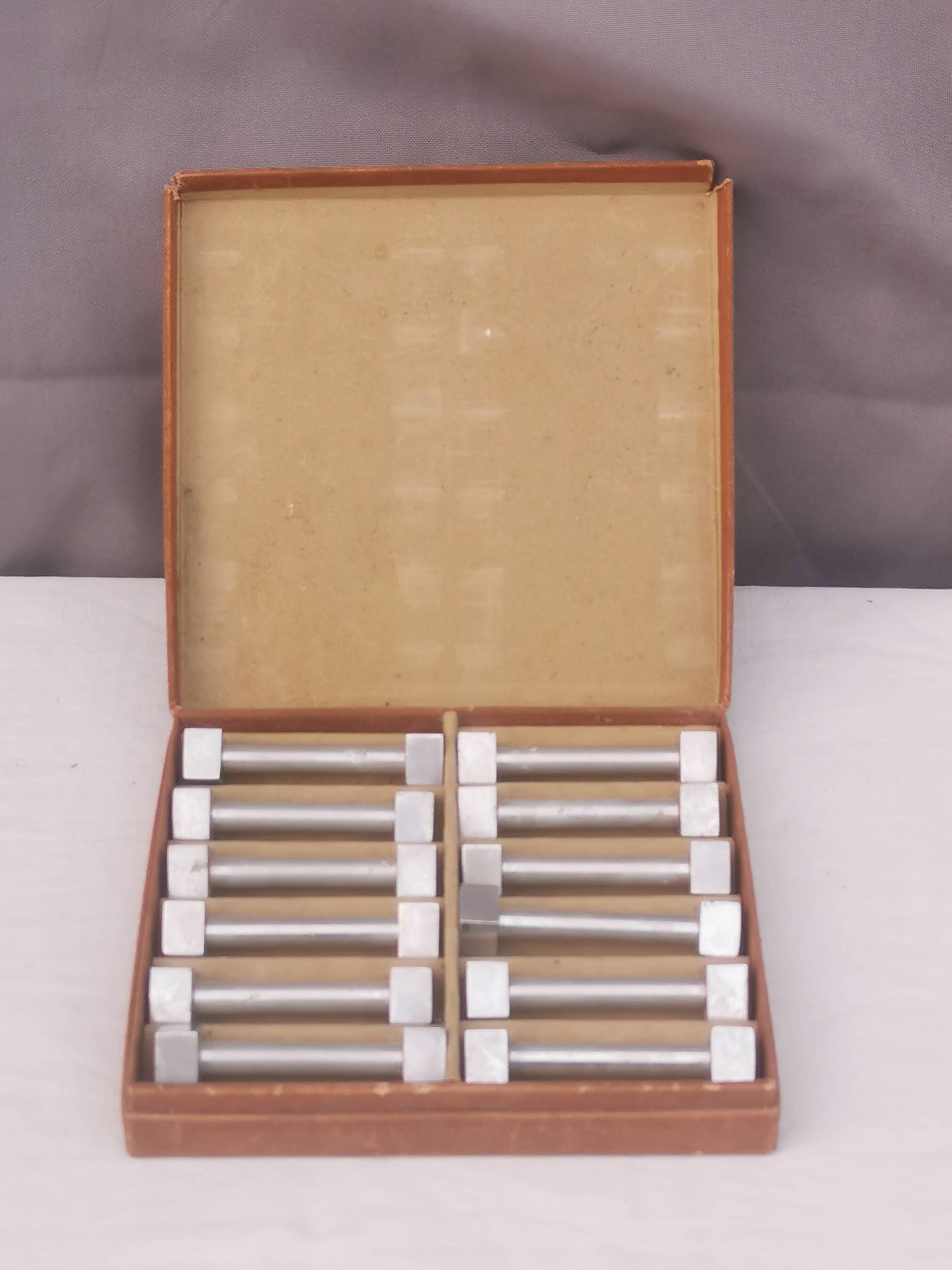 Box of 12 vintage “art-deco” knife holders