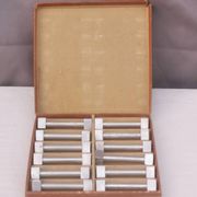 Box of 12 vintage “art-deco” knife holders
