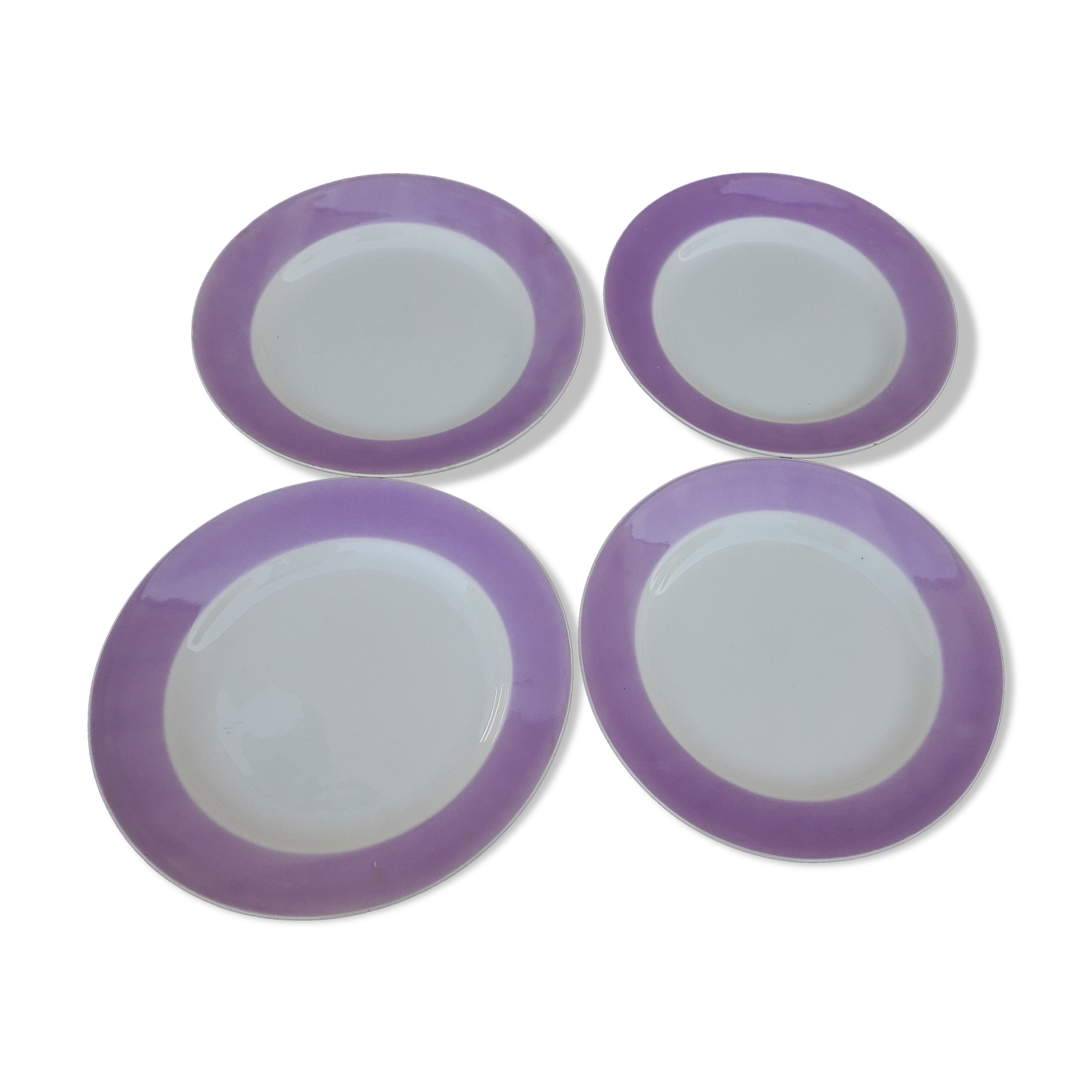 4 plates in Gien earthenware with a purple marli