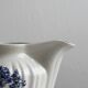 Porcelain sauce boat with blue pastoral pattern