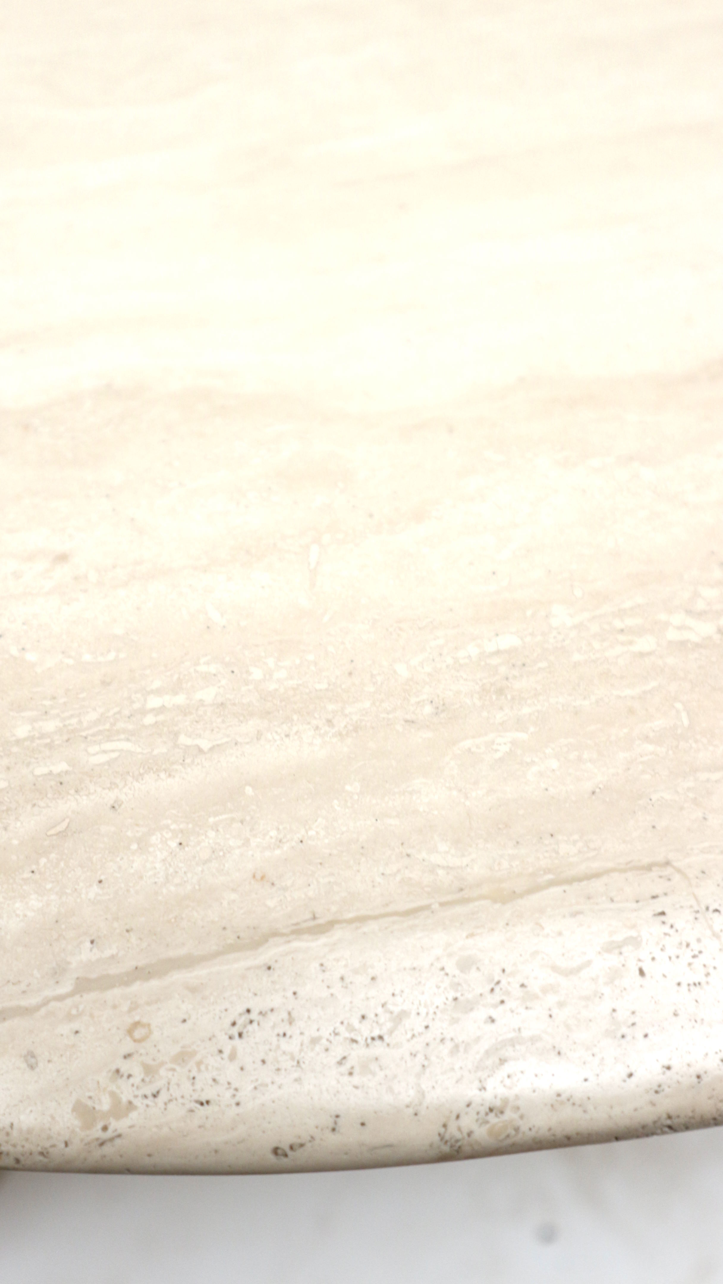 Oval travertine coffee table made in the 1970s