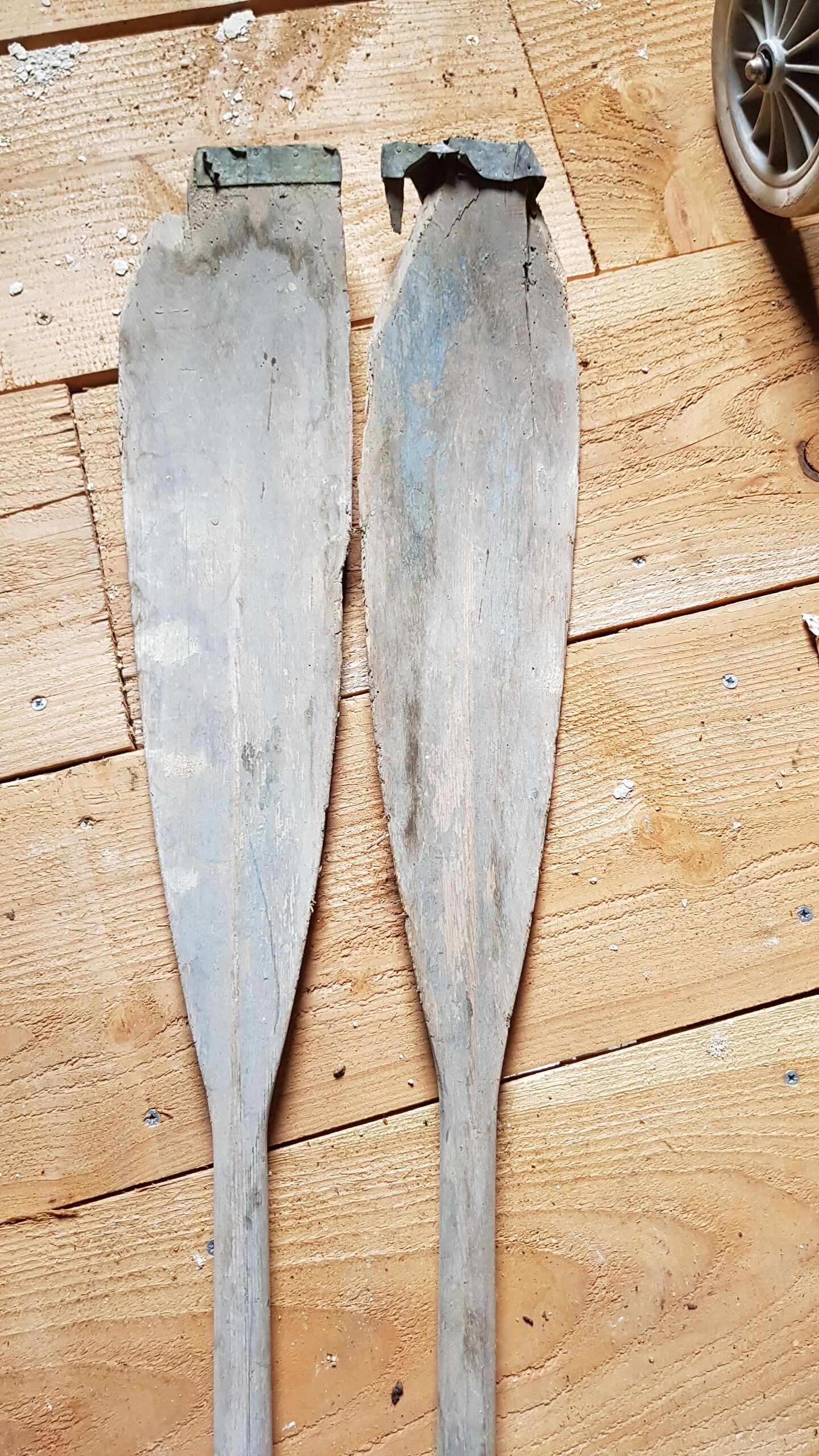 Pair of old wooden oars