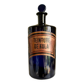 Kola tincture apothecary bottle in blue glass