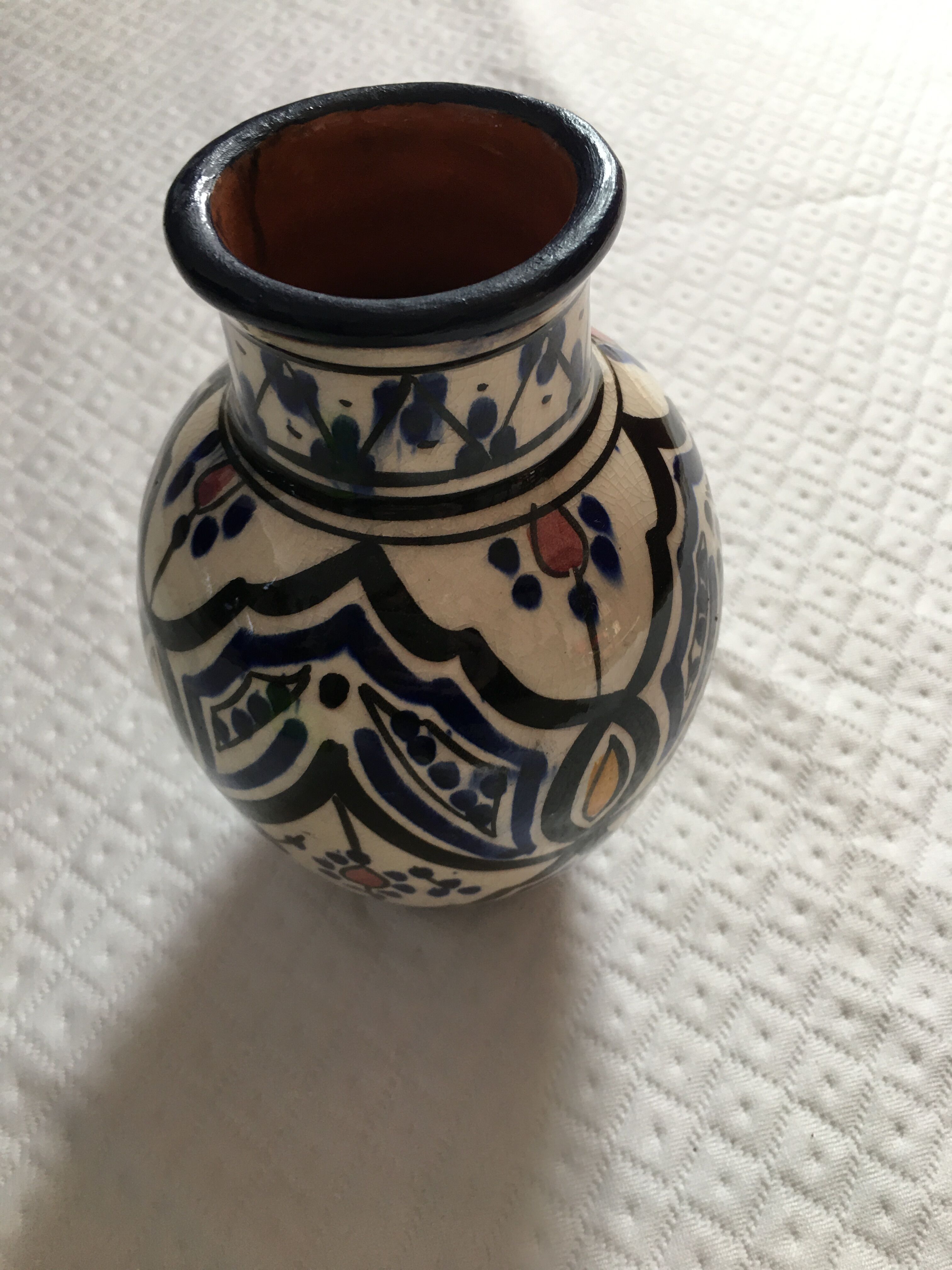 small ceramic vase