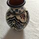 small ceramic vase