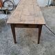 Large antique farmhouse table with a drawer