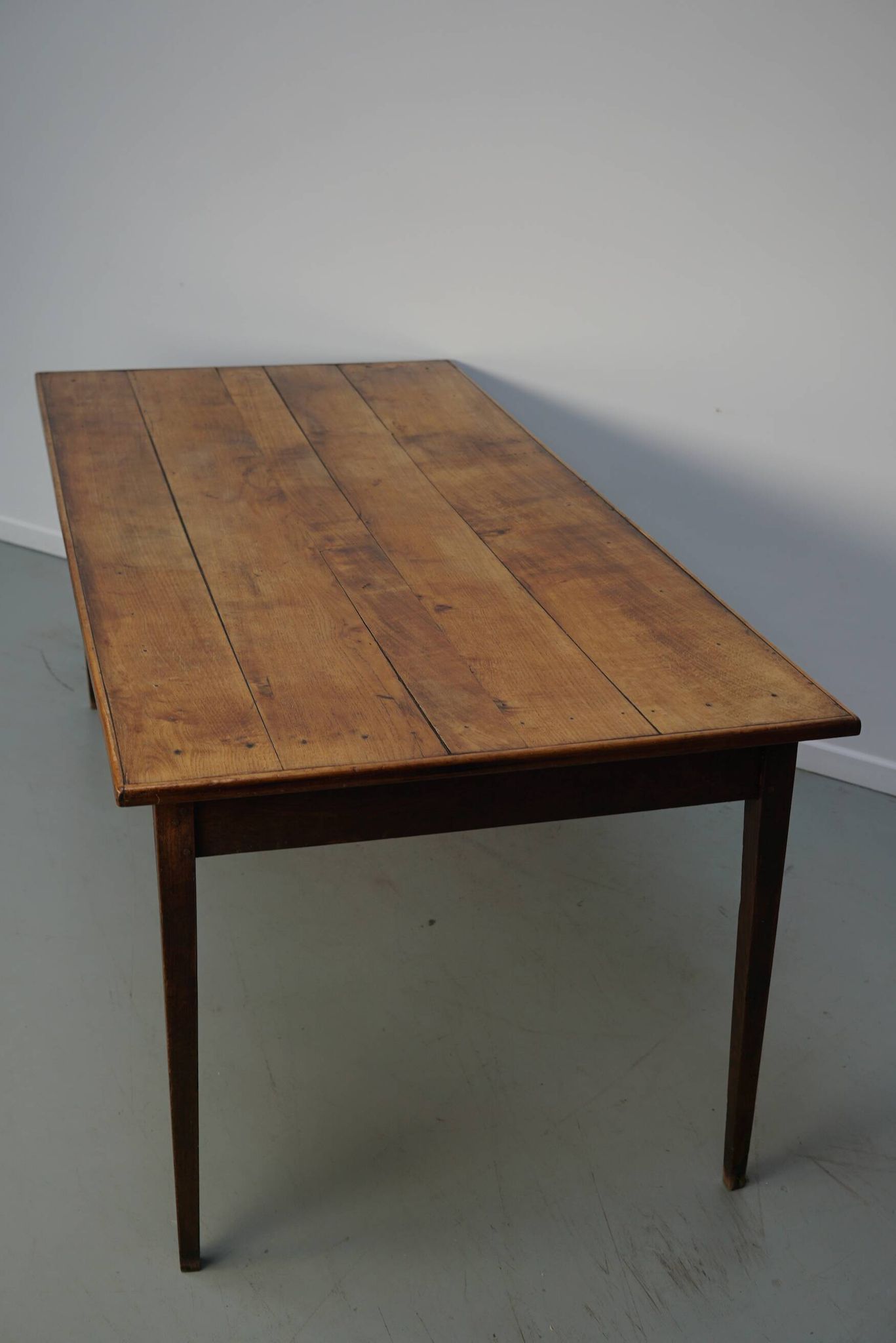 Table à manger en chêne de ferme rustique française du début du 20e siècle