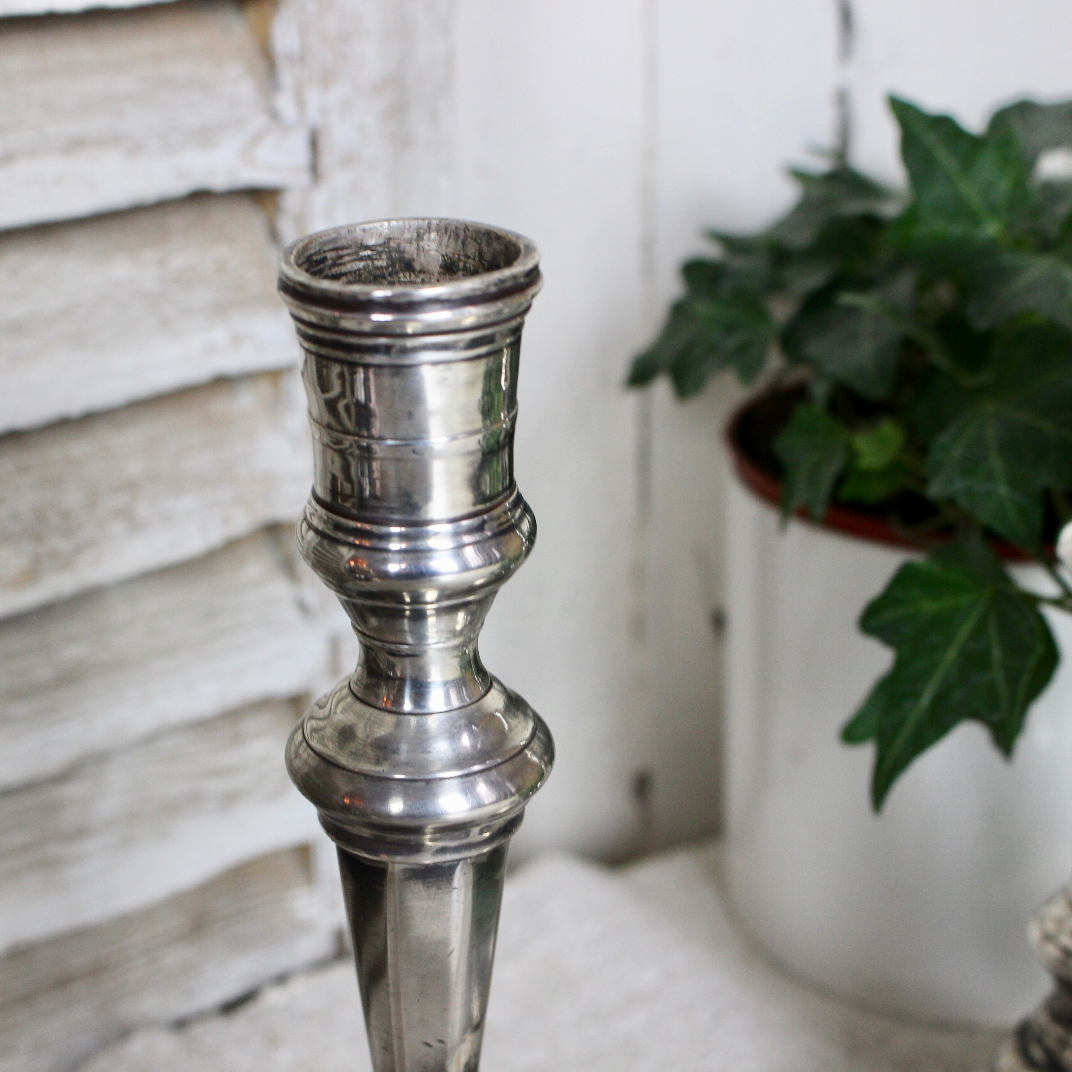 Pair of silver-plated bronze candlesticks