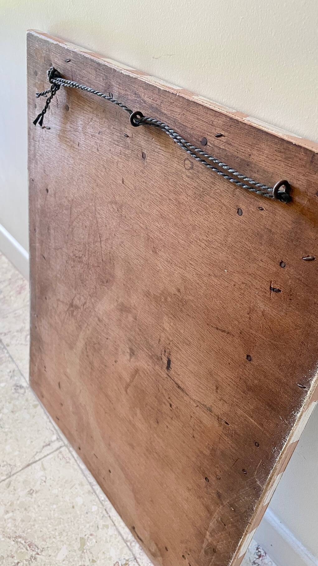 Old mirror in hand-painted wood