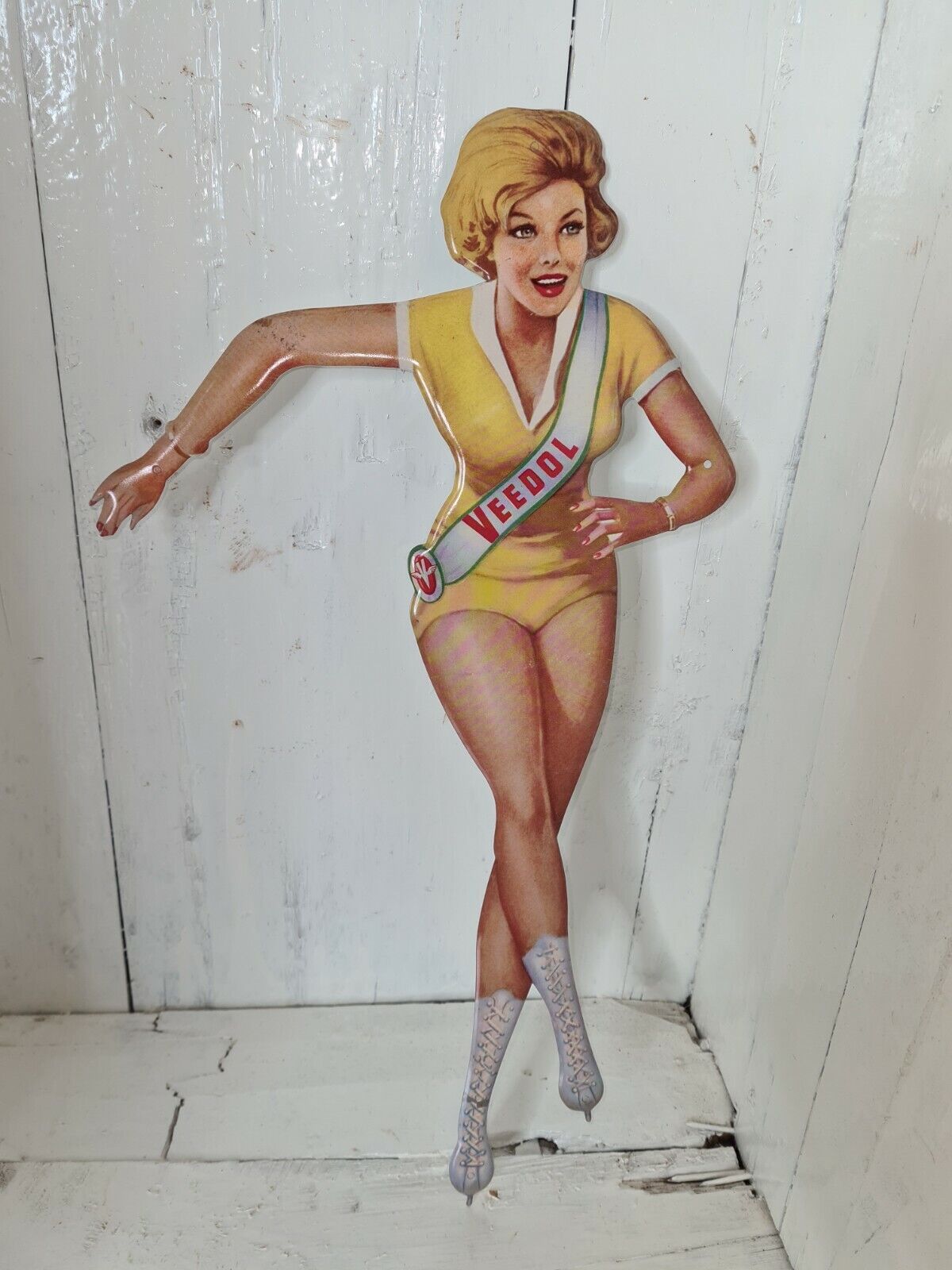 Veedol pin up advertising plate