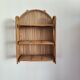 Rattan wall shelf