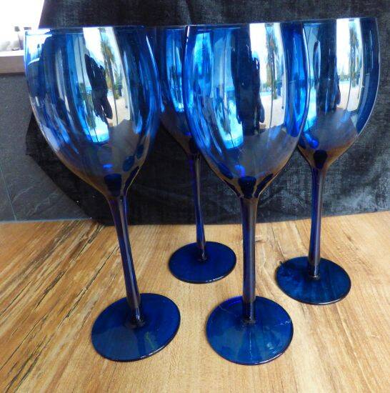 4 large vintage blue wine glasses.