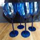 4 large vintage blue wine glasses.