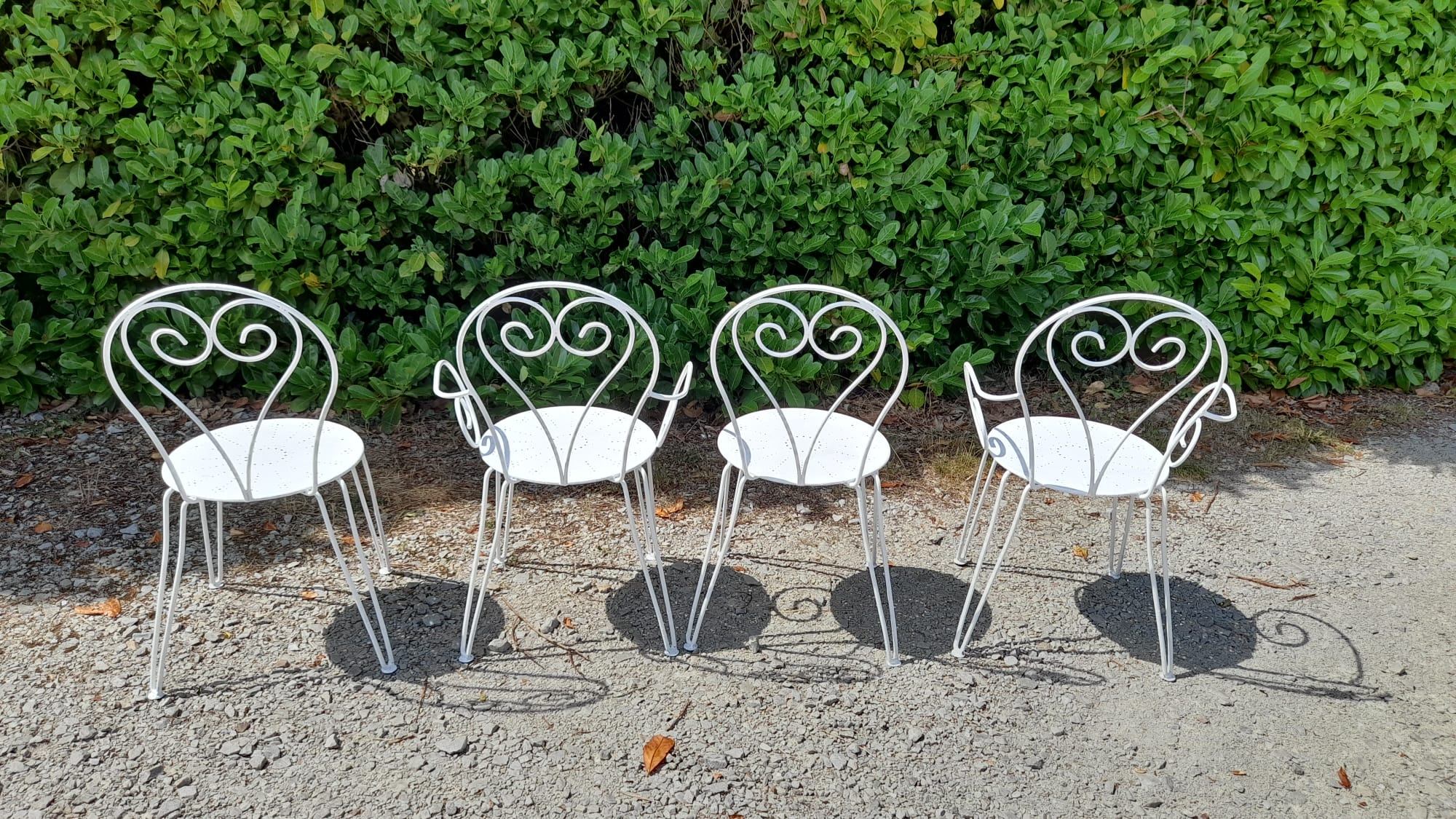 Garden furniture in white wrought iron