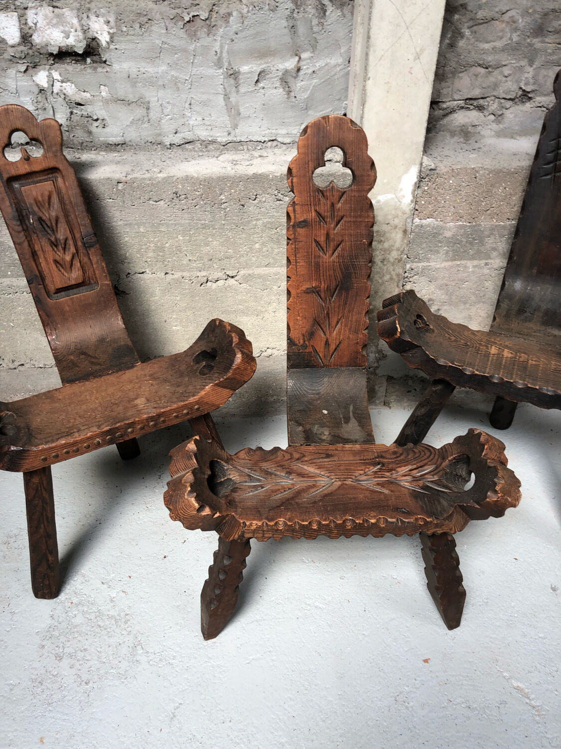 Brutalized tripod chairs