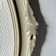 Oval frame in weathered wood