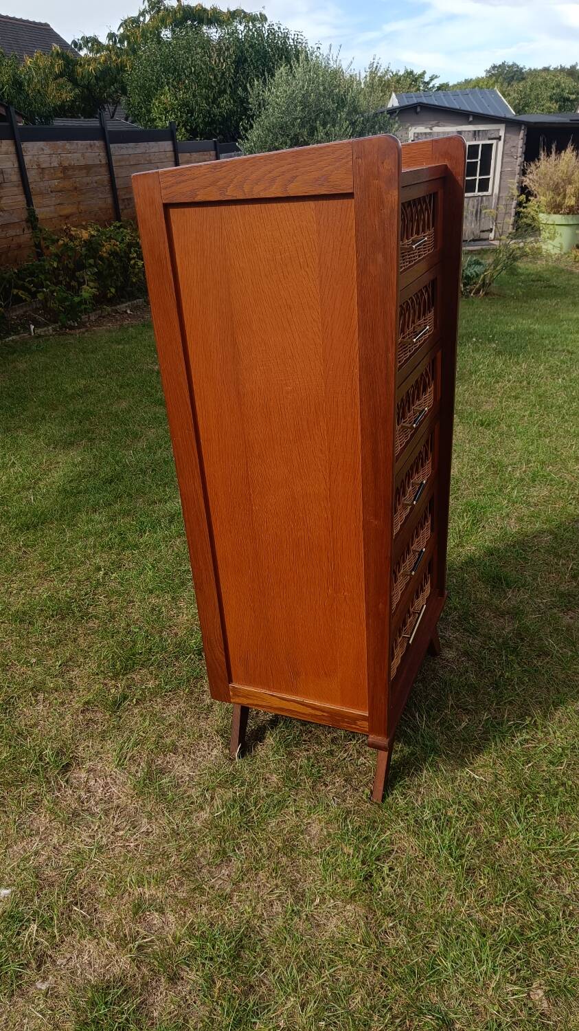 Tall chest of drawers in wood and rattan with splayed legs