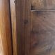 Empire wardrobe in solid walnut, France, mid-19th century.