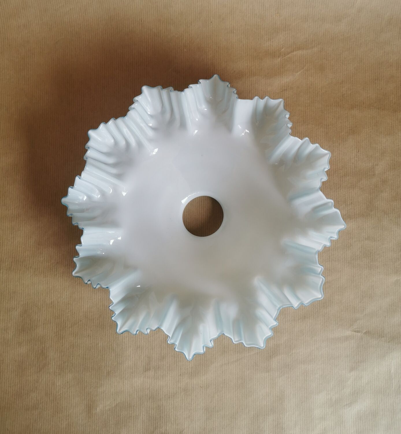 Blue opaline suspension