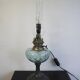 Oil lamp transformed into a bedside lamp