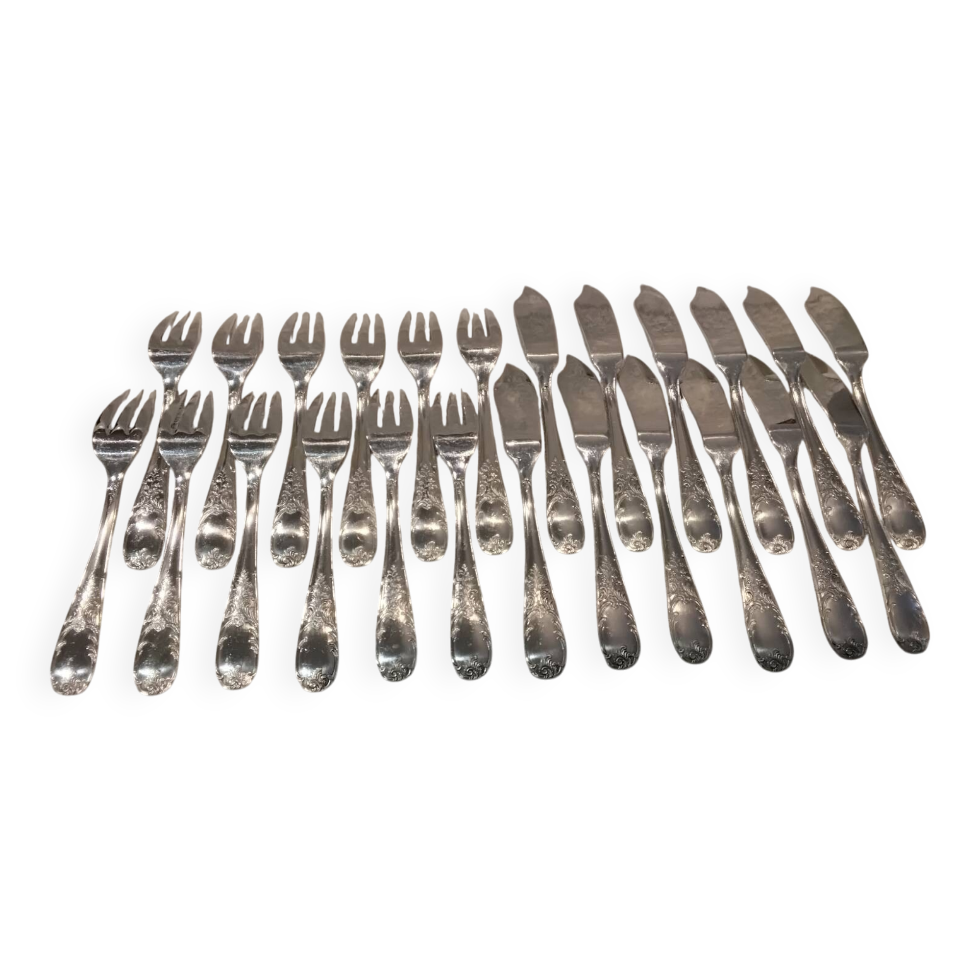 12 forks, 12 fish knives, silver-plated metal, rocaille pattern