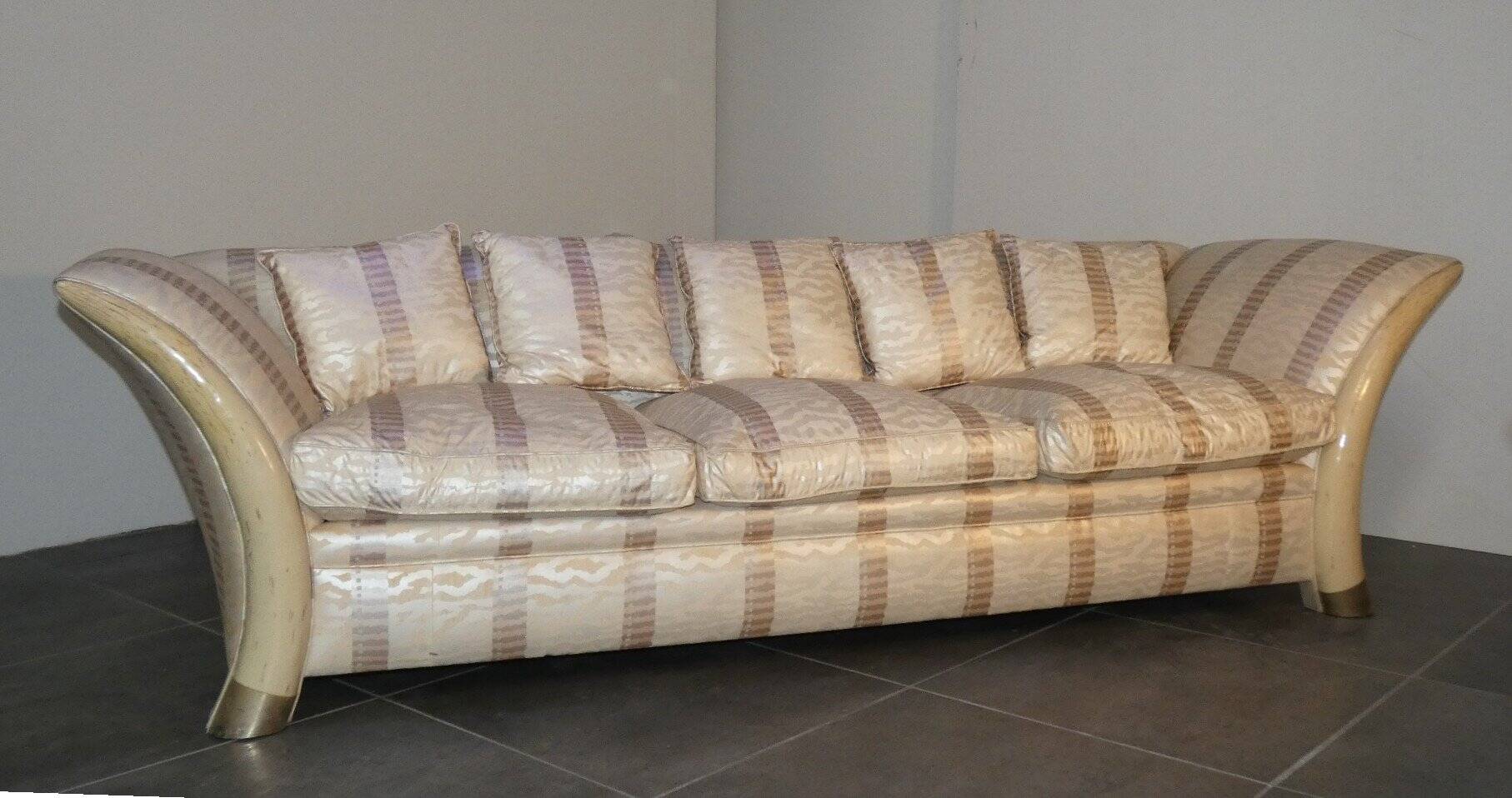 Sofa and armchair in colonial style with saber legs in resin, Italy, 1970s.