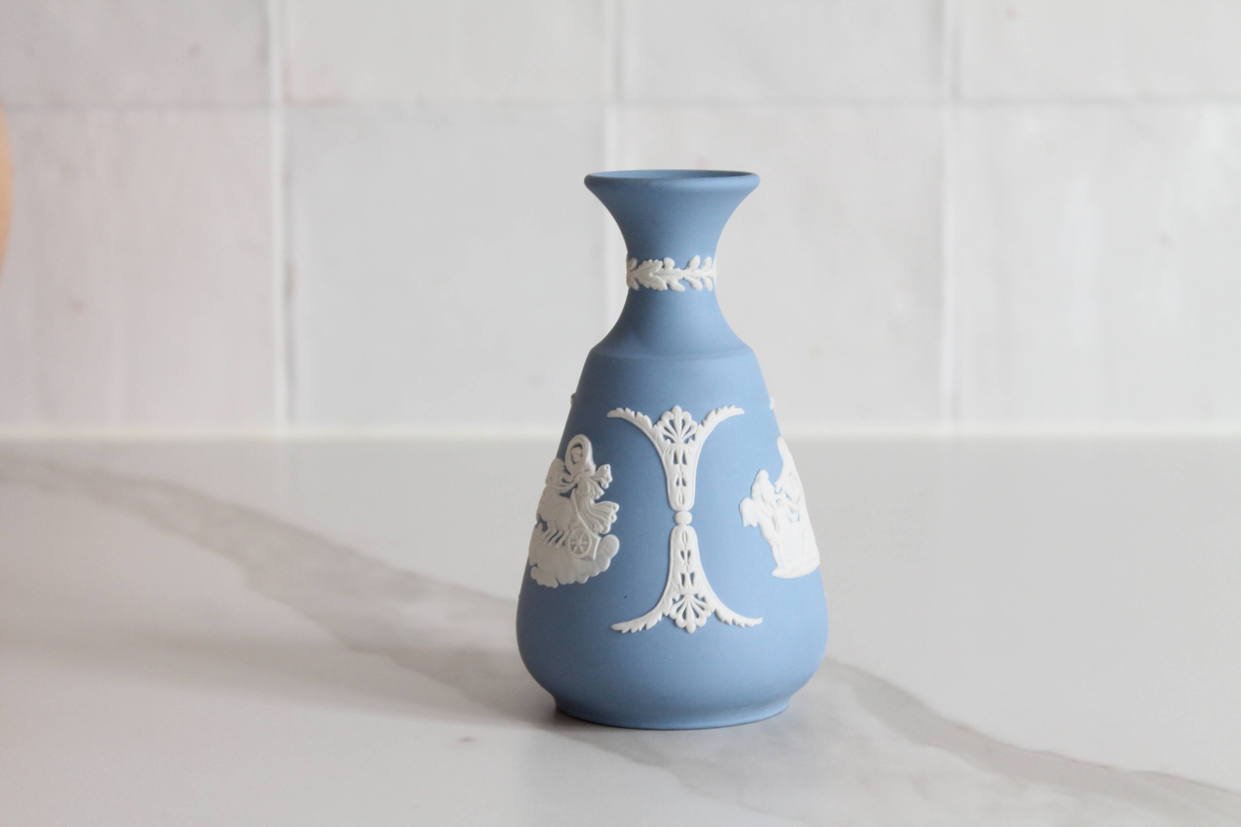 Blue porcelain vase by Wedgwood.