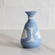 Blue porcelain vase by Wedgwood.