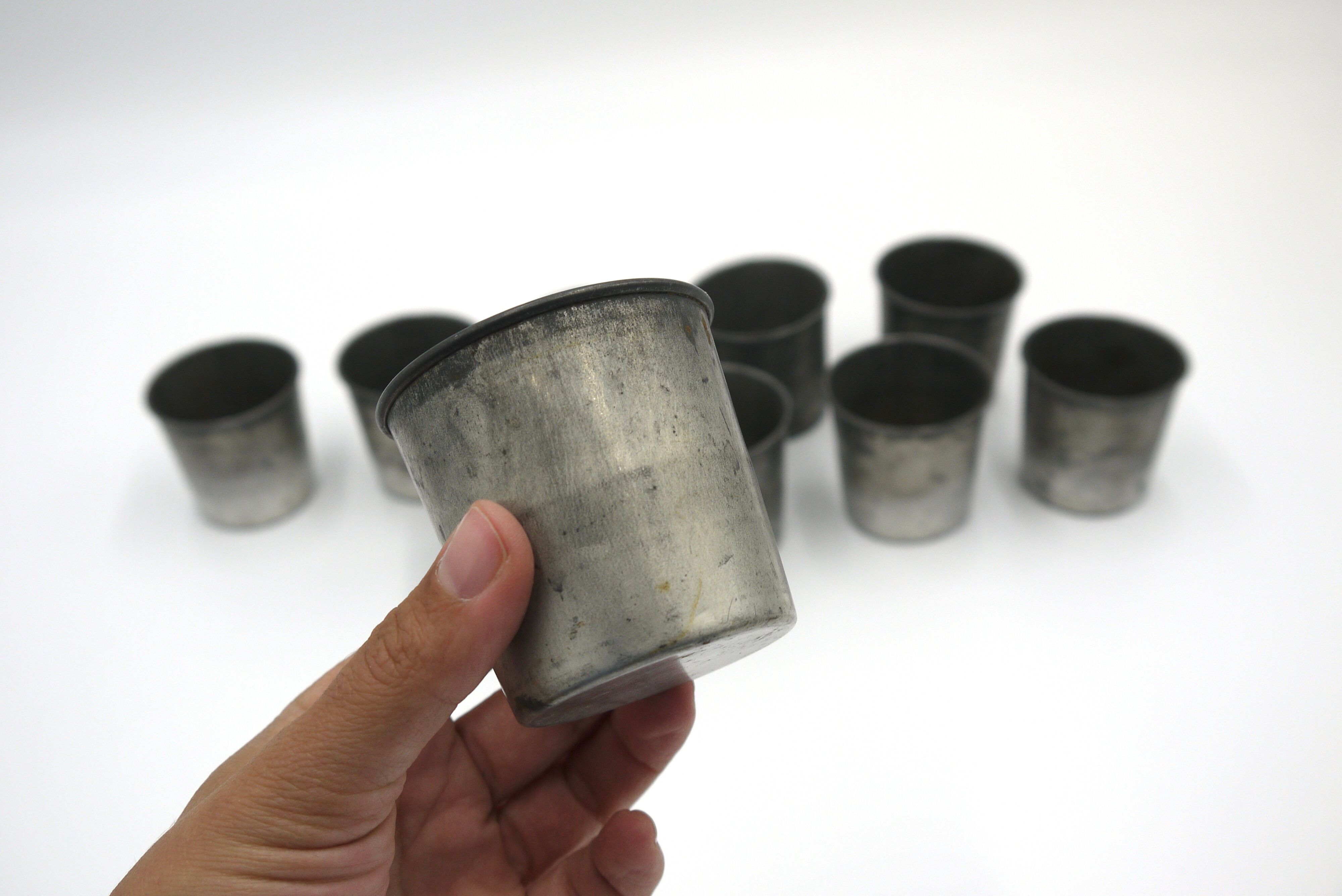 Set of 10 tin cups