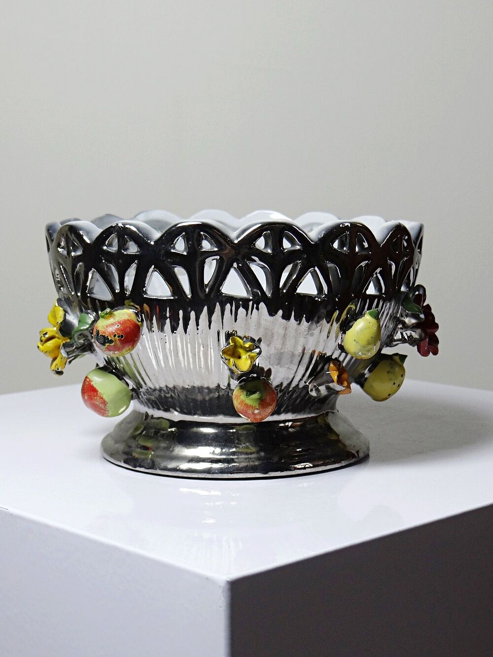 Vintage Italian silver-plated porcelain bowl with cut-out design of fruits and flowers.