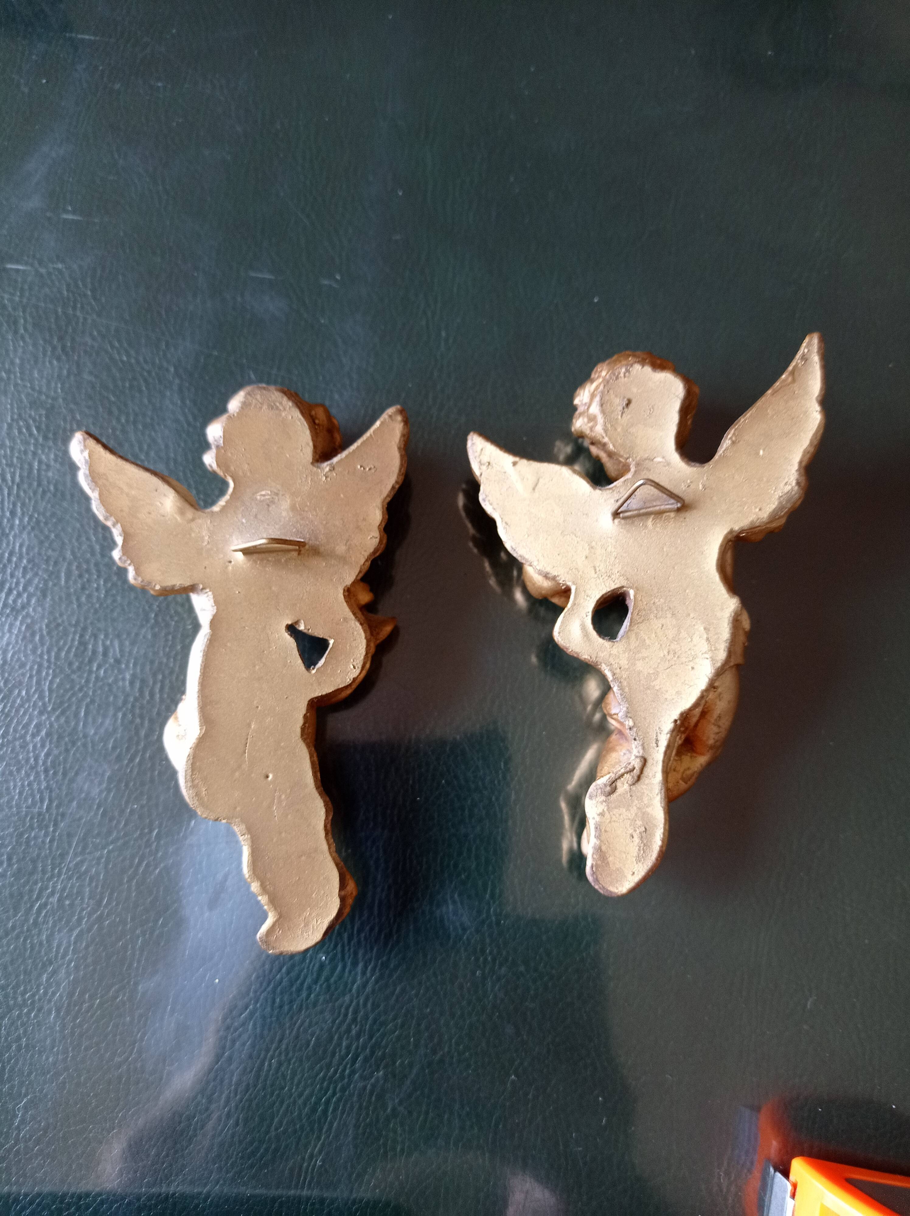 Set of two plaster cherubs gilded with fine gold