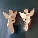 Set of two plaster cherubs gilded with fine gold