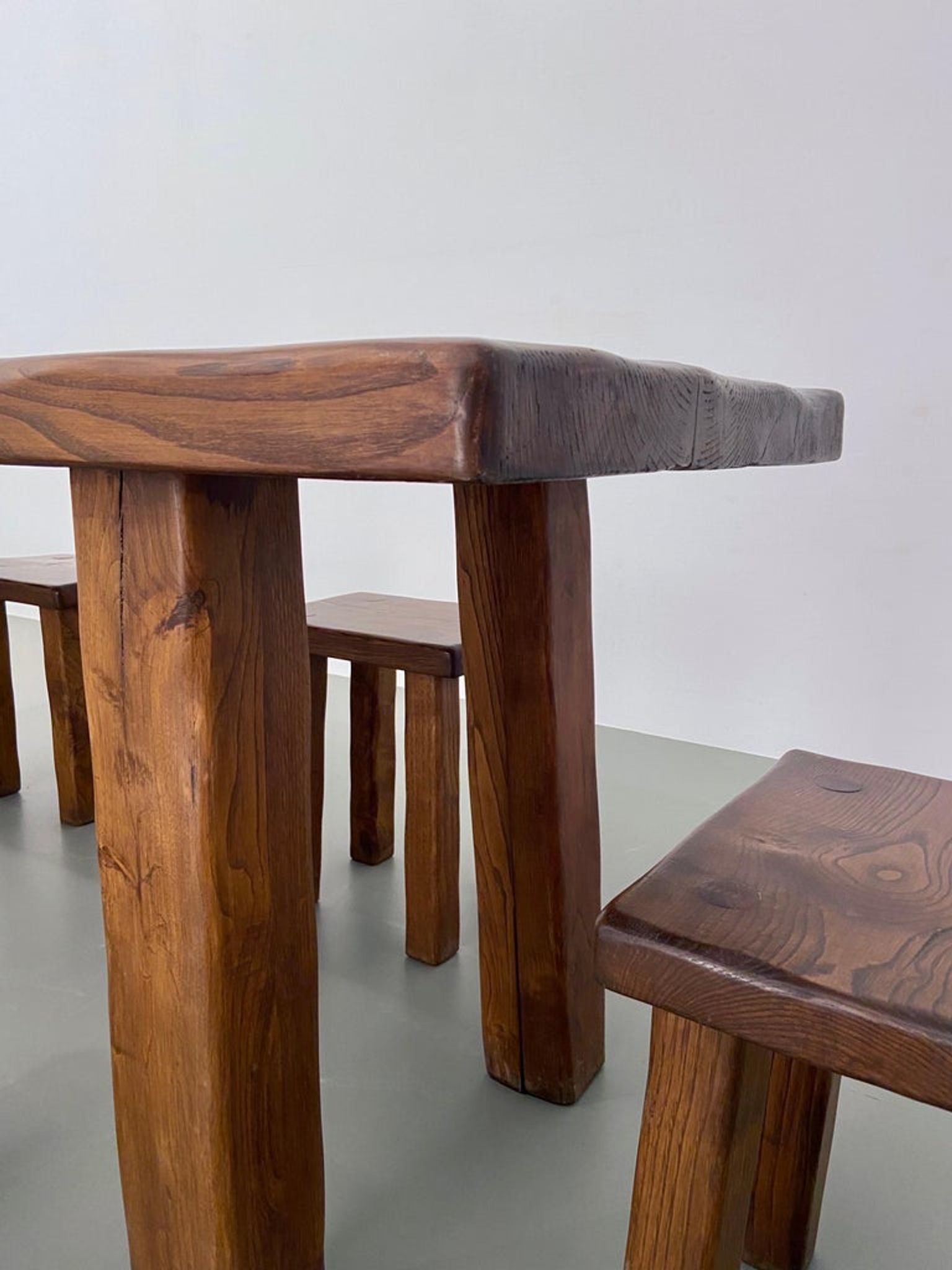 Solid elm dining set including 6 stools France 1970s