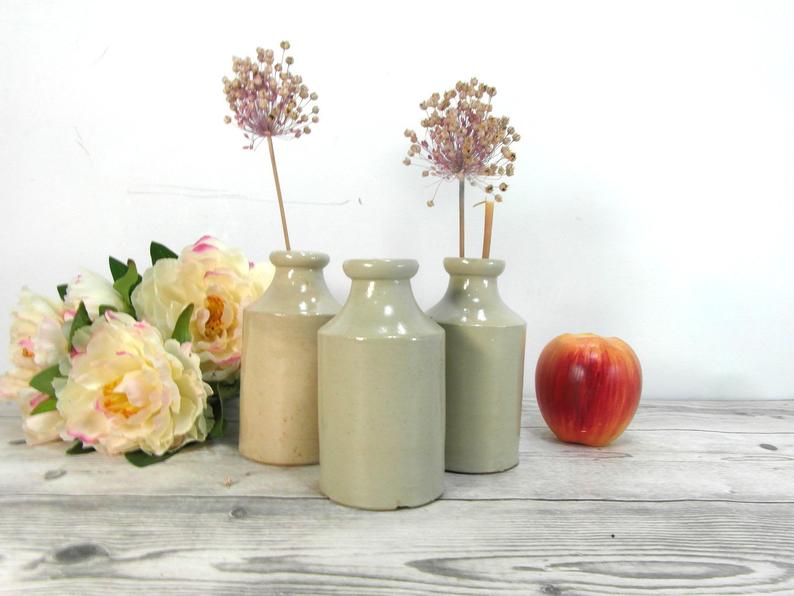 Lot of 3 sandstone bottles