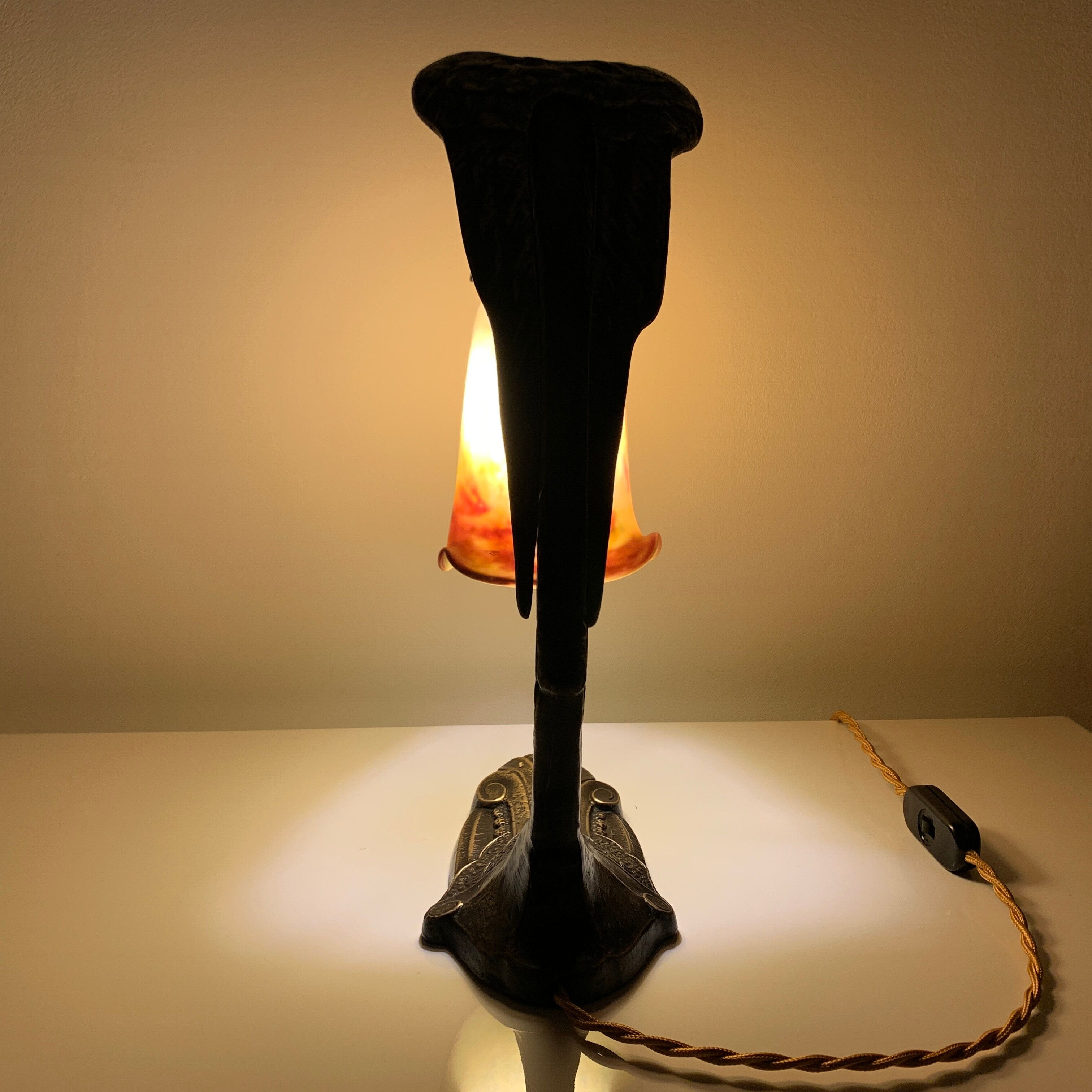 Bronze eagle lamp patinated and Art Nouveau style glass pate