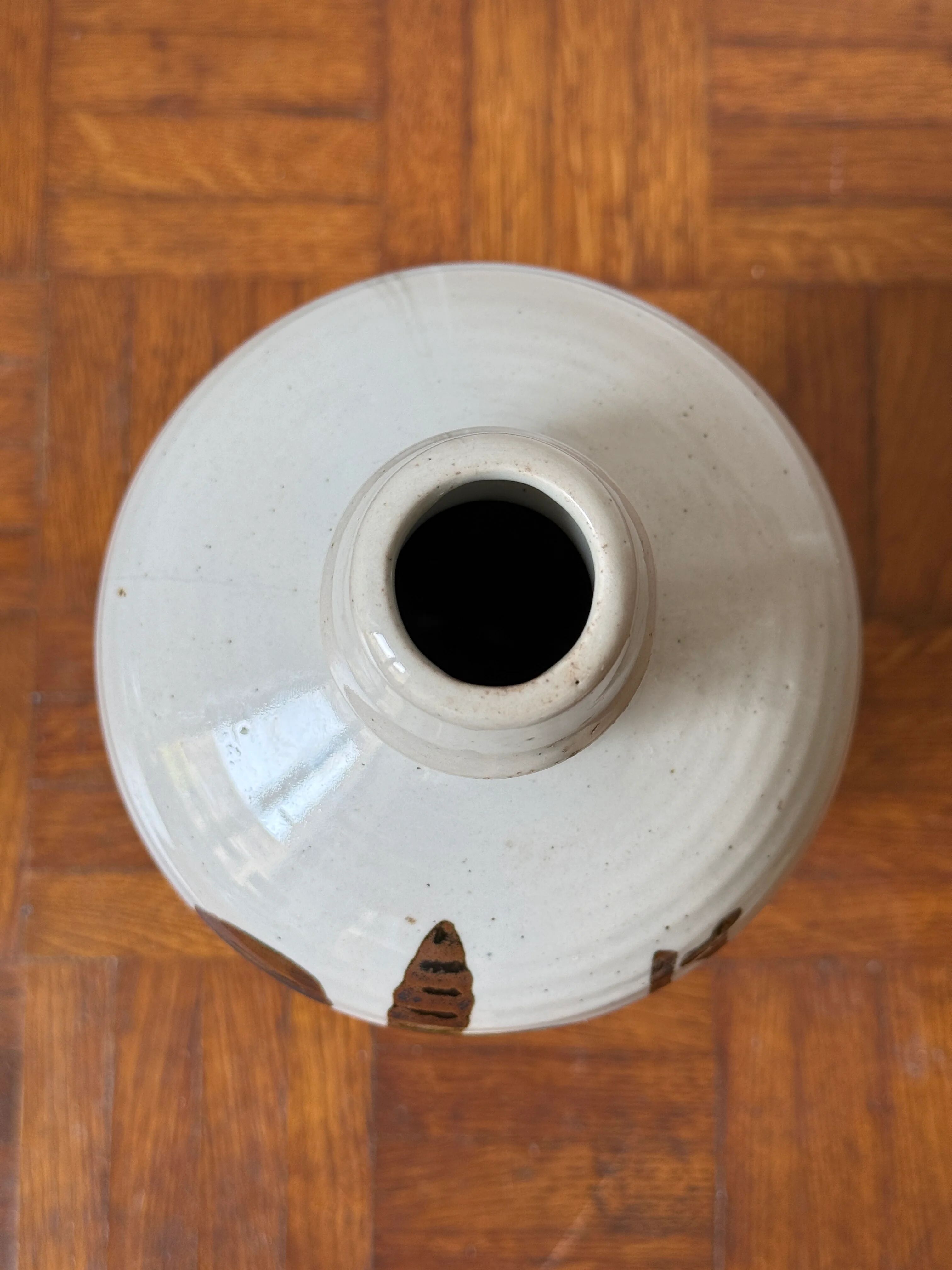 Old Japanese sake bottle in tokkuri shape.