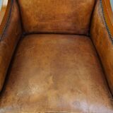 Sheep leather Art Deco design armchair combined with wood
