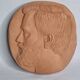 Bas-relief mural in terracotta, profile of a man, signed, 21 x 20 cm, 1984.