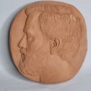 Bas-relief mural in terracotta, profile of a man, signed, 21 x 20 cm, 1984.